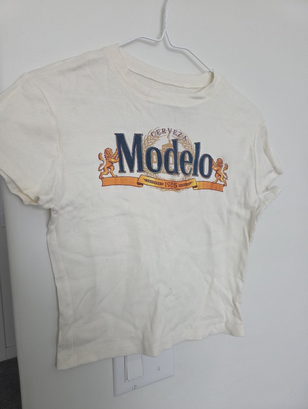 Modelo Cream Graphic Tee with Navy & Gold Logo